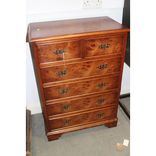 348 - A burr elm chest of two short and four long drawers, on bracket supports, 14 1/4