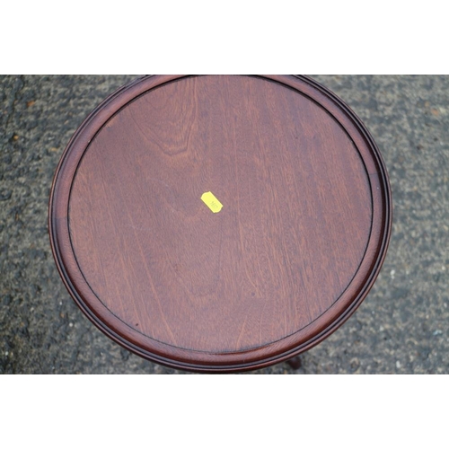 374 - A mahogany and banded oval tray top wine table, 19