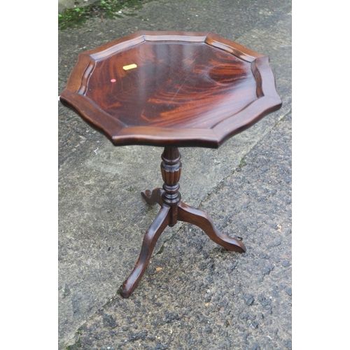 374 - A mahogany and banded oval tray top wine table, 19