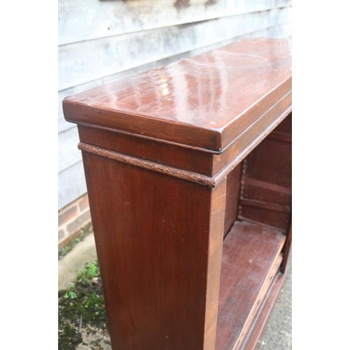 381 - A mahogany open bookcase, fitted adjustable shelves, on block base, 36