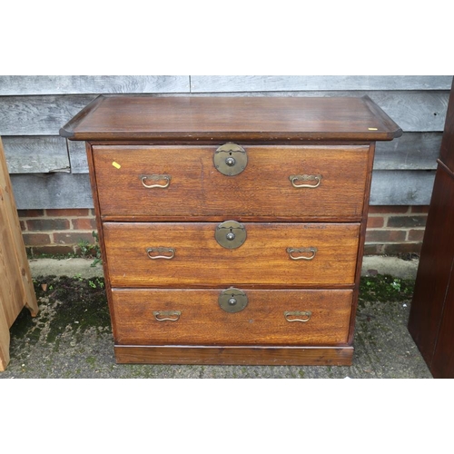 394 - A Korean chestnut chest of three long drawers with brass handle plates, 38 3/4