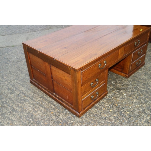 397 - A Korean hardwood low table, fitted five drawers, on block base, 33 1/4