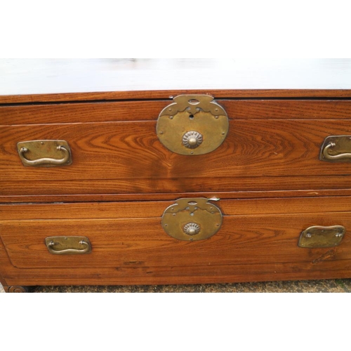 401 - Two Korean two-drawer chests, on scroll feet, 36