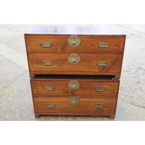 401 - Two Korean two-drawer chests, on scroll feet, 36