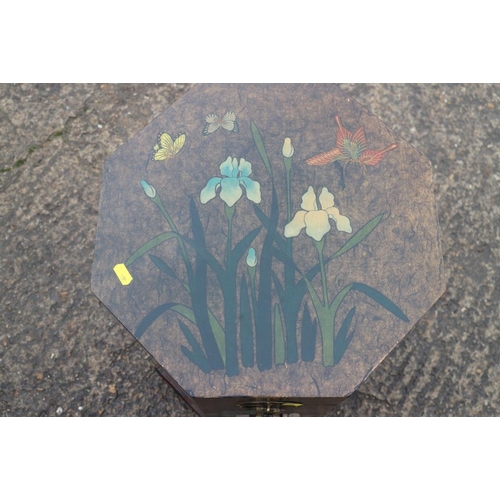 404 - An Oriental octagonal lacquered box with insect and iris design, 15