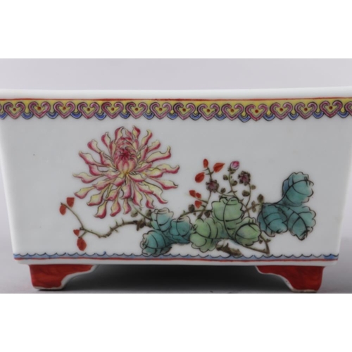 62 - A Chinese porcelain famille rose decorated rectangular planter, 9 1/2