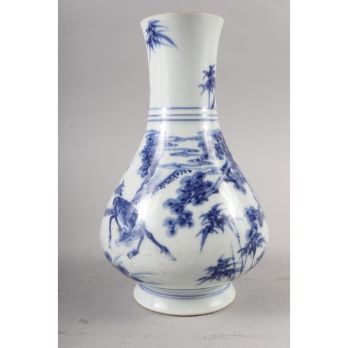 67 - A Chinese blue and white baluster vase, decorated fallow deer in a landscape, with six character mar... 