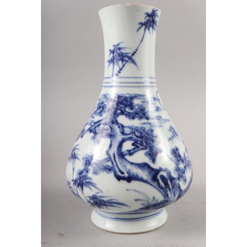 67 - A Chinese blue and white baluster vase, decorated fallow deer in a landscape, with six character mar... 