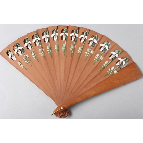 82 - A late 19th century ivory fan with bluebird sequinwork design, and five other fans