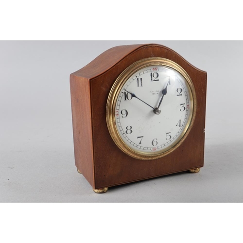 84 - An Edwardian walnut and line inlaid mantel clock, 5 1/2