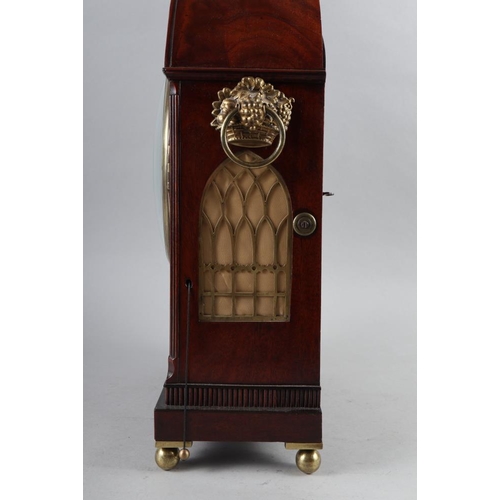 88 - A Regency mahogany arch-top cased bracket clock by Grayson of Henley with hour repeat and striking m... 