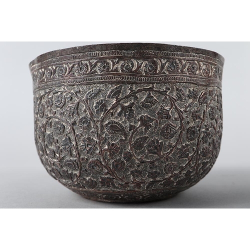 94 - A Middle Eastern engraved and silvered copper bowl, 5 1/4