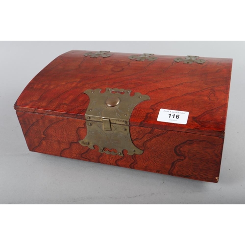 116 - A Korean burr elm dome box with brass fittings, 12