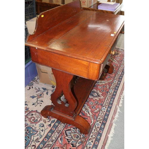 296 - A late Victorian mahogany ledge back washstand, fitted two drawers and undertier, on pierced panel e... 