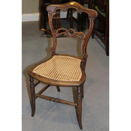 334 - A late Victorian grained as rosewood carved bar back side chair with caned panel seat