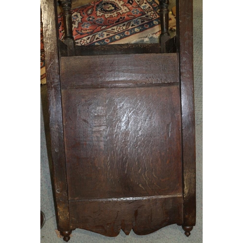 339 - A late 17th century oak wainscot chair with panel seat, on turned and stretchered supports, 20