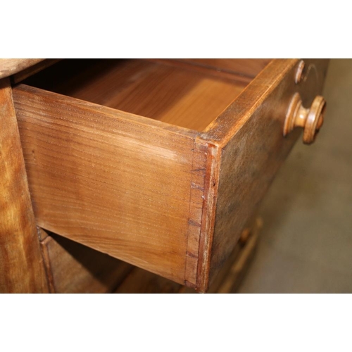 340 - A Victorian figured walnut chest of two short and three long drawers with turned knob handles, on bl... 