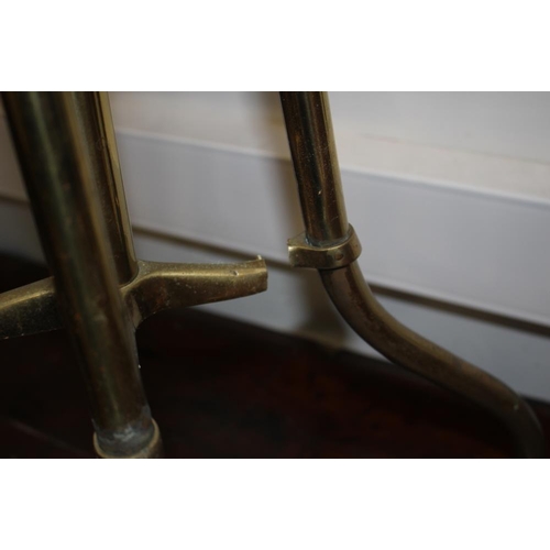 360 - An early 20th century brass framed piano stool with adjustable seat