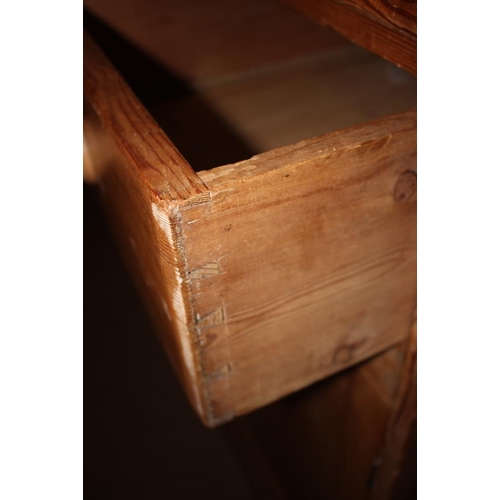 415 - A waxed pine side cabinet, fitted two drawers over two doors, on block base, 40 1/2