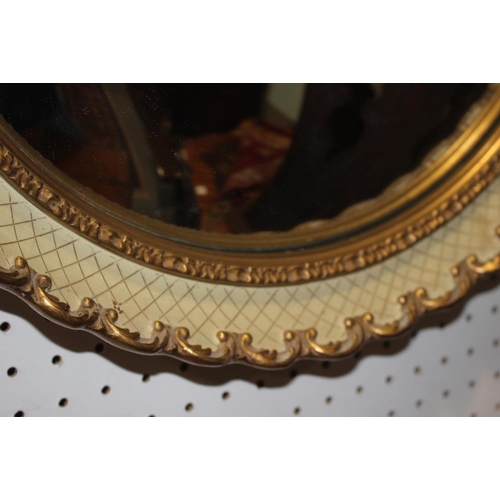 435 - A gilt framed convex wall mirror with cream cross-hatched decoration, plate 13