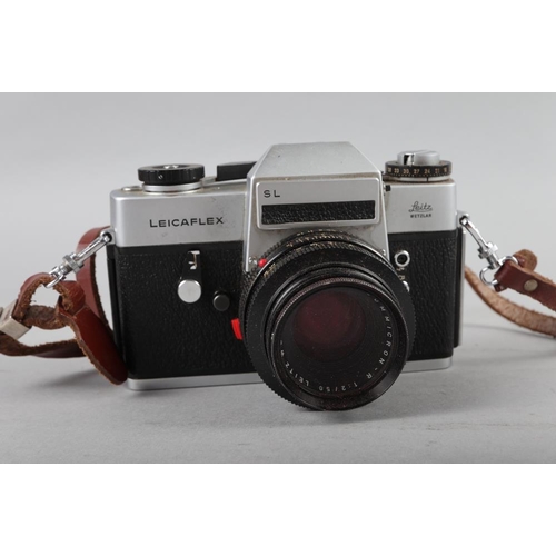 83 - A Leicaflex SL Leitz Wetzlar camera, Serial Number 1295519 and Summircron R 1:2/50 lens, in travelli... 