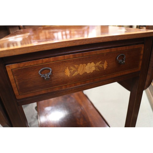 386 - A mahogany and satinwood banded two-tier tea trolley, fitted one drawer, 26