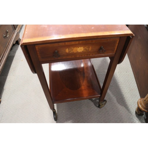 386 - A mahogany and satinwood banded two-tier tea trolley, fitted one drawer, 26