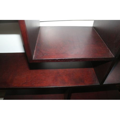 389 - An Oriental hardwood open shelf wall unit, fitted two drawers and undertier, 40