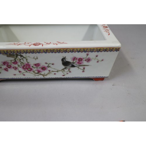 62 - A Chinese porcelain famille rose decorated rectangular planter, 9 1/2