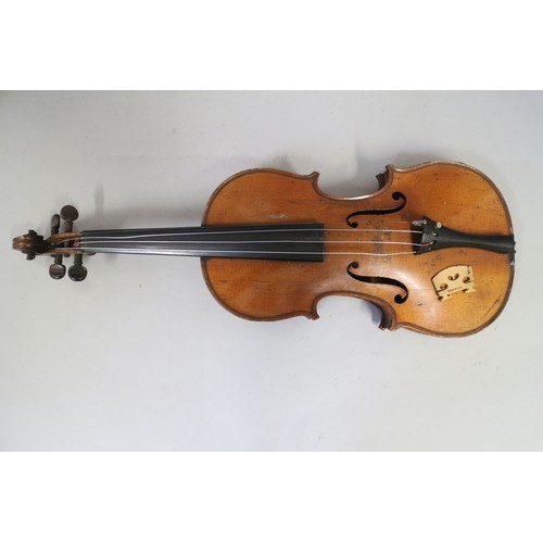 137 - A violin with two-piece back and a bow, 22 3/4