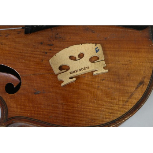 137 - A violin with two-piece back and a bow, 22 3/4