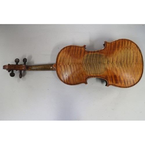 137 - A violin with two-piece back and a bow, 22 3/4