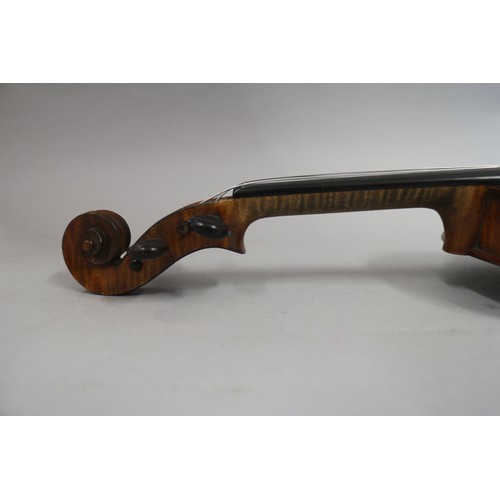 137 - A violin with two-piece back and a bow, 22 3/4