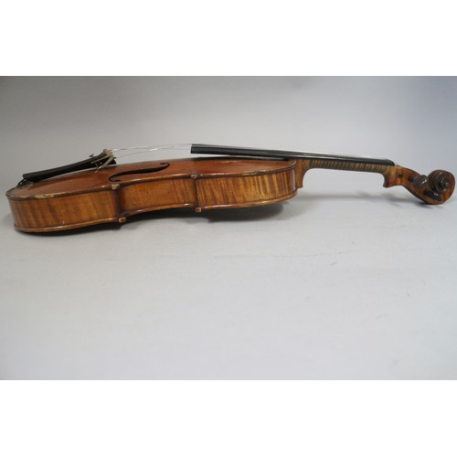 137 - A violin with two-piece back and a bow, 22 3/4