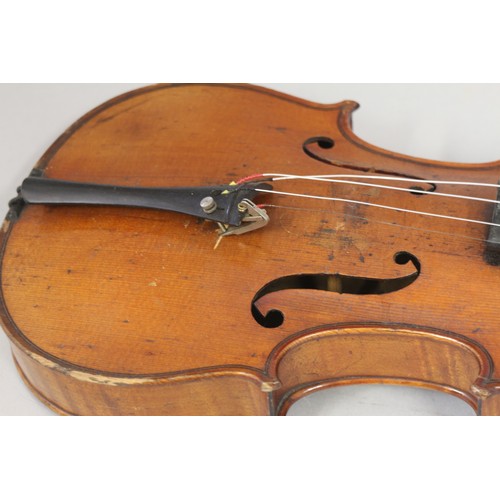 137 - A violin with two-piece back and a bow, 22 3/4