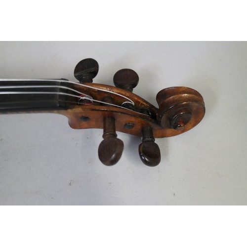 137 - A violin with two-piece back and a bow, 22 3/4