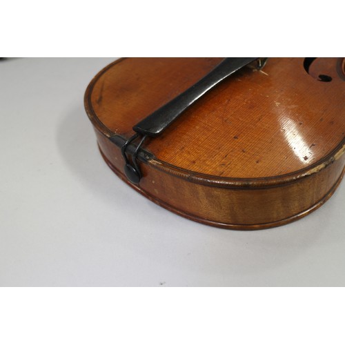 137 - A violin with two-piece back and a bow, 22 3/4