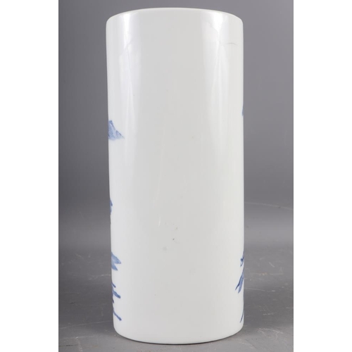 107 - A Japanese blue and white oval shaped vase, decorated trees and figures in a boat (hairline crack), ... 