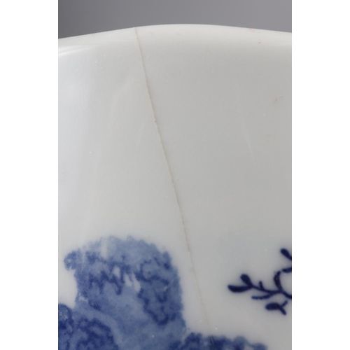 107 - A Japanese blue and white oval shaped vase, decorated trees and figures in a boat (hairline crack), ... 