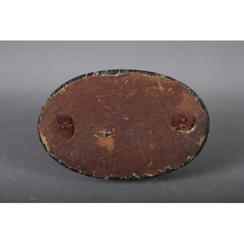 151 - A mid 19th century Continental bronze and marble oval desk weight, formed as two dolphins, 5 3/4