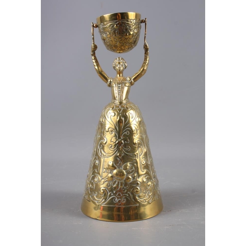 152 - A brass wager cup, 8 1/2