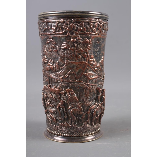 152 - A brass wager cup, 8 1/2