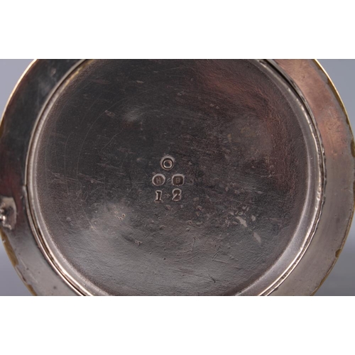 152 - A brass wager cup, 8 1/2