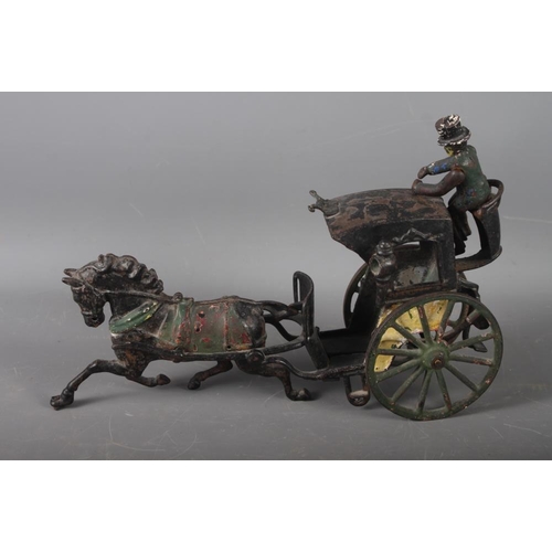 186 - A painted die-cast model of a hansom cab