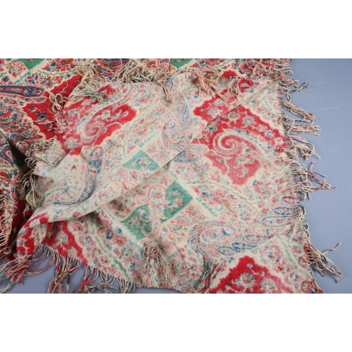 204 - A 19th century printed paisley type shawl, 52