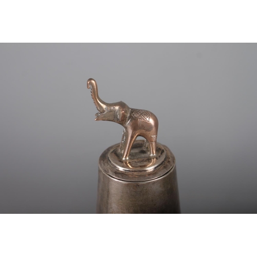 235 - An Indian ceramic and white metal bottle neck vase with elephant finial, 10 1/4