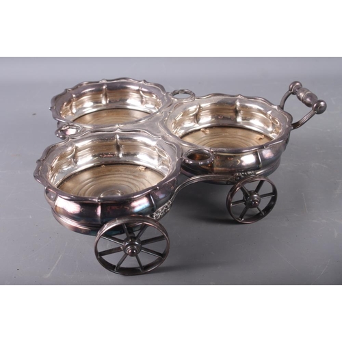 299 - A 19th century silver plated decanter wagon, for three decanters 14