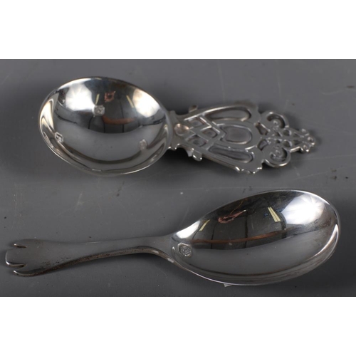 304 - A modern silver dog-nose caddy spoon and another modern silver caddy spoon with Celtic style handle,... 