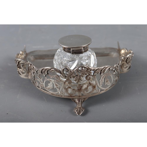 312 - A silver desk stand with pierced gallery and cut glass inkwell with silver lid