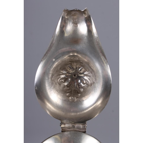 322 - An 18th century silver pedestal hot water jug with acorn finial, acanthus and laurel leaf decoration... 